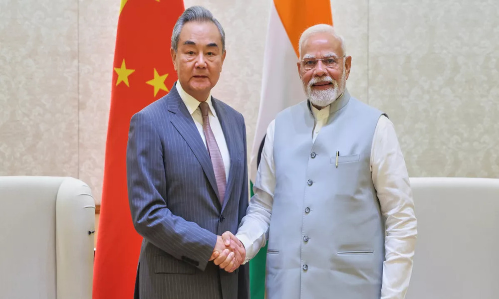 Modi holds talks with China’s top diplomat in effort to repair bilateral relations
