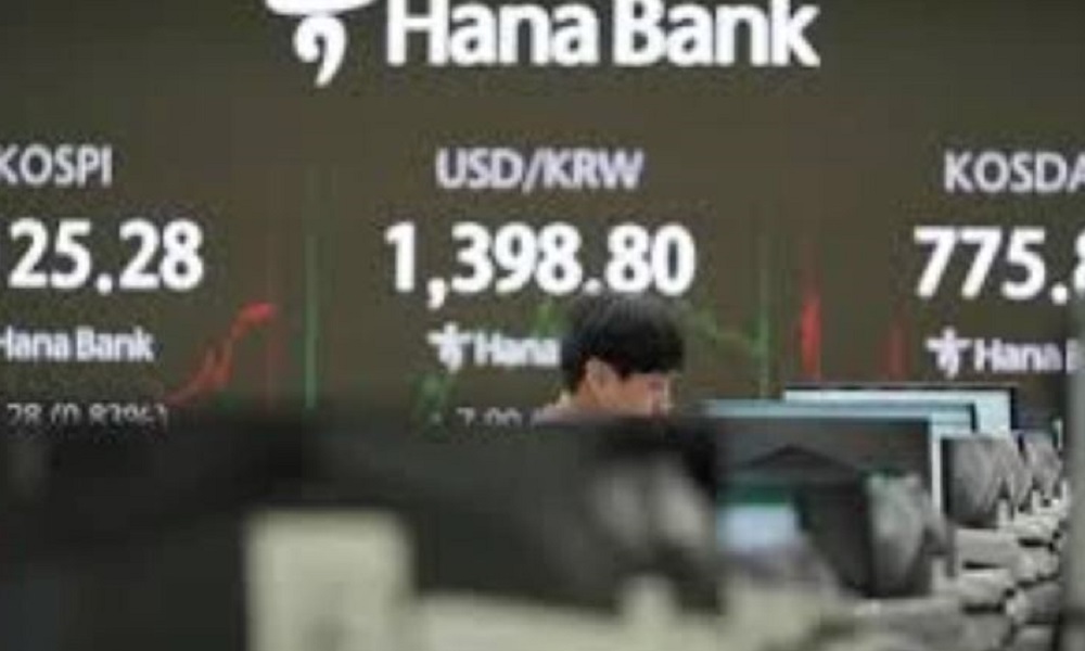 Asian shares mostly higher as Wall Street ends mixed